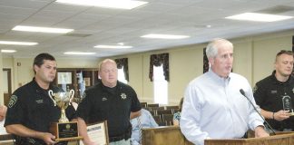 Coweta County Sheriff Mike Yeager (white shirt, at podium) in 2017. File photo.