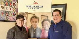 The America Heart Association named the Coweta Charter Academy at Senoia No. 1 in the state again this year for its “Hoops for Heart” fundraising campaign. Pictured, from left, are coach Barbara Mulligan and Principal Gene Dunn. Photo/Submitted.