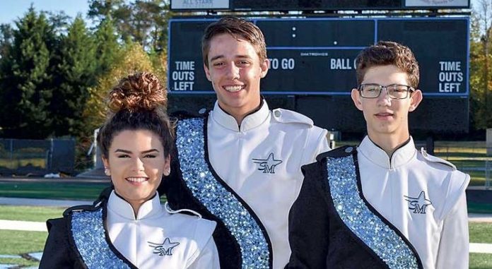 Starr’s Mill Panther Pride Marching Band members, from left, Camber Bransky, Zach Garcia and Kevin Allen will perform in the Macy’s Great American Marching Band Thanksgiving Day. Photo/Submitted.