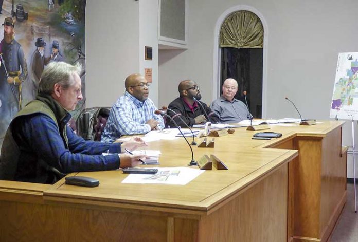 Members of the Tyrone Planning Commission recommended approval of a request to amend the Founders Studios development agreement. Pictured, from left, are Commissioner Jeff Duncan, Chairman Wil James and commissioners Marlon Davis and David Nebergall. Photo/Ben Nelms.