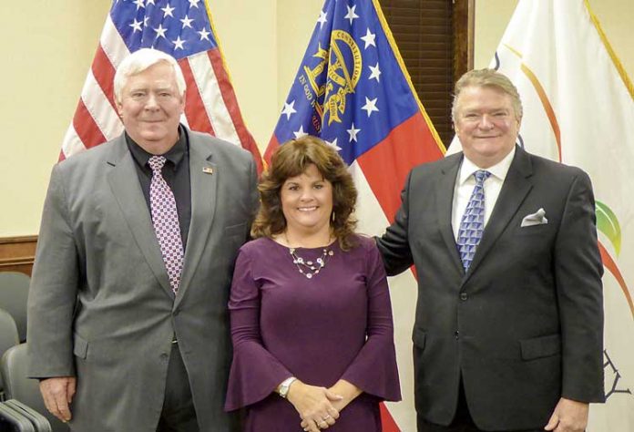 Peachtree City Mayor Vanessa Fleisch, center, and Councilmen Terry Ernst (L) and Kevin Madden (R) were sworn in prior to the Jan. 4 meeting of the Peachtree City Council. For Fleisch and Ernst, it will be their second term, while Madden was seated for his first term of office. Photo/Ben Nelms.