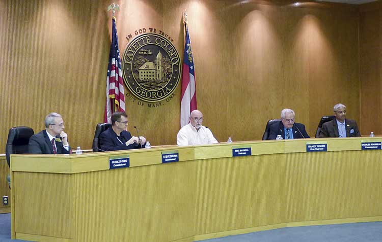 Fayette County Commission members at the March 8 meeting included, from left, commissioners Chuck Oddo and Steve Brown, Chairman Eric Maxwell, and commissioners Randy Ognio and Charles Rousseau. Photo/Ben Nelms.