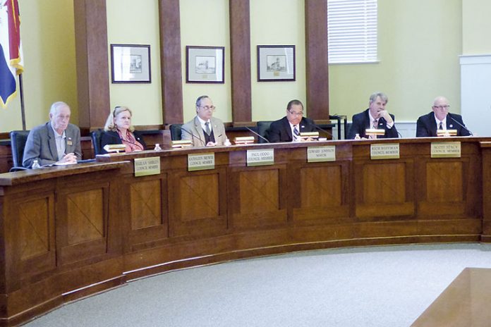 The Fayetteville City Council hears a presentation. Photo/Ben Nelms.