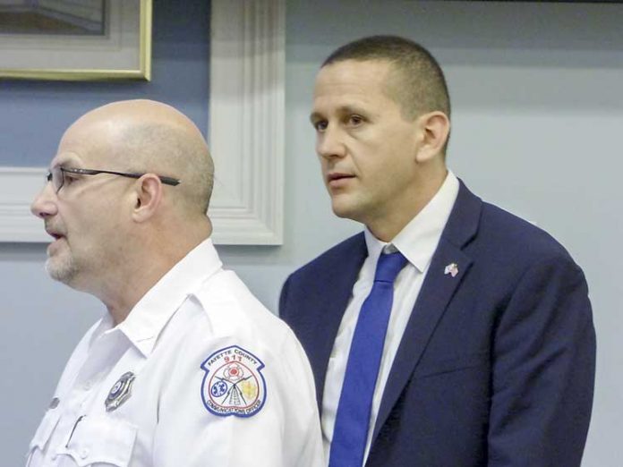 Fayette County 911 Director Bernard “Buster” Brown, at left, at the March 22 meeting of the Fayette County Commission was joined by Carbyne911 U.S. Chief Operating Officer Eyal Elyashiv. Photo/Ben Nelms.