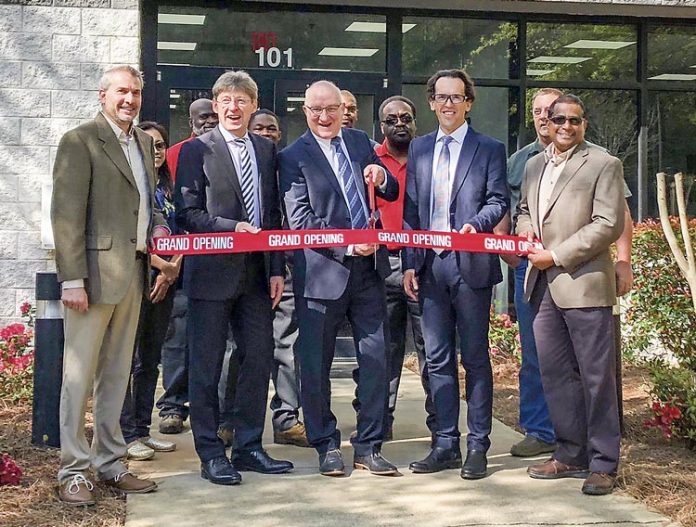 SILON representatives were joined by govenment and industry guests at the April 12 ribbon-cutting at the company’s $20 million industrial plant in Peachtree City. Pictured, from left, are SILON Plant Manager Scott Whiteside, CFO Dr. Bernd Morawitz, CEO Dr. Wolfgang Riediger, COO Drahomir Koudelka and Technical Services and QA Manager Carl Mahabir. Photo/Submitted.