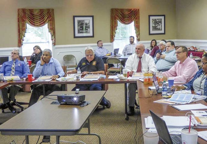 Fayette County Commission members attending the 2018 retreat on April 18-20 included, from left in the foreground, commissioners Chuck Oddo, Charles Rousseau and Randy Ognio, Chairman Eric Maxwell and Commissioner Steve Brown. Photo/Ben Nelms.