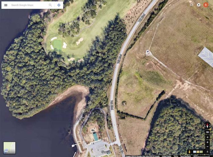 A 5.1-acre undeveloped peninsula, at left, adjacent to the Planterra golf course in Peachtree City and surrounded on three sides by Lake McIntosh is proposed for lakefront condominium development. Graphic/Google Maps.