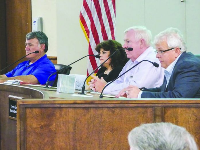 Peachtree City Council members hear discussion about garbage pickup at the council retreat May 1. Above, L-R, Mike King, Mayor Vanessa Fleisch, Terry Ernst and Phil Prebor. Photo/Ben Nelms.
