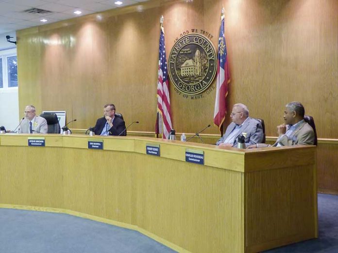 Members of the Fayette County Commission at the May 10 meeting included, from left, commissioners Chuck Oddo, Steve Brown, Randy Ognio and Charles Rousseau. Chairman Eric Maxwell also attended the meeting. Photo/Ben Nelms.