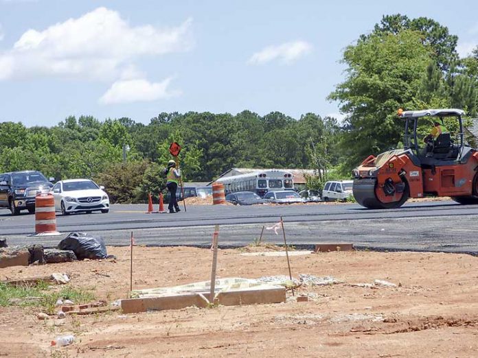 Work on the new intersection at Ga. Highway 92 North, Westbridge and Veterans Parkway is nearly complete, with the new intersection linking to Fayetteville’s west side expected to open in July. Photo/Ben Nelms.