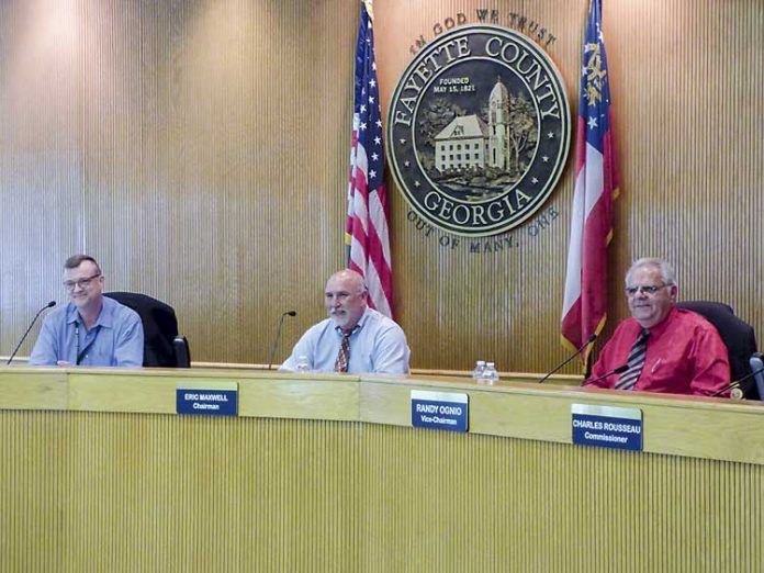 Fayette County commissioners at the July 12 meeting included Steve Brown, Chairman Eric Maxwell and Randy Ognio. Photo/Ben Nelms.