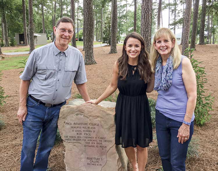 Jim and Mary Pace, along with Rachel Cathy (C) were at Berry College in Rome on Aug. 18 for the unveiling of the Pace Adventure Course, named for their daughter, Kim, who worked with WinShape Teams on the Berry campus. Photo/Submitted.