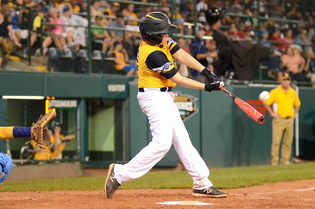 Peachtree City Little League’s Jack Ryan makes contact with a pitch during a Little League World Series game in Williamsport. Photo/Brett R. Crossley.