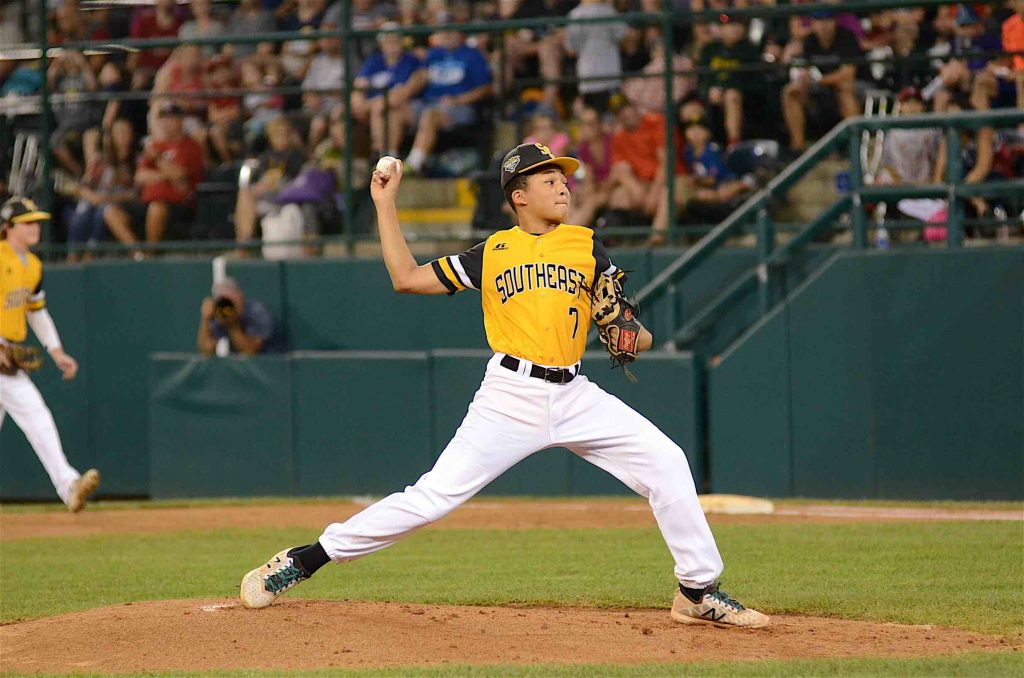 Peachtree City’s Tai Peete delivers a pitch during a Little League World Series game against the Northwest. Peete hit a double and pitched three innings of no-hit baseball to help Peachtree City win 3-0. Photo/Brett R. Crossley.