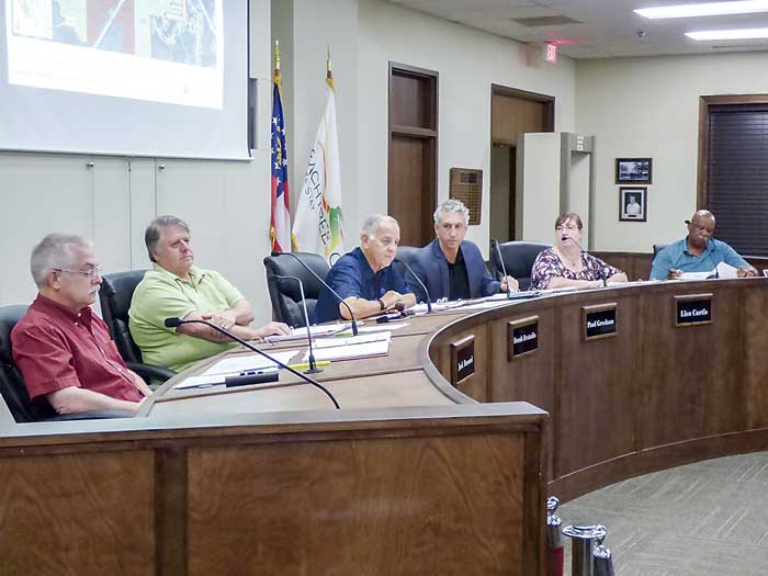 Members of the Peachtree City Planning Commission at the Sept. 24 meeting included, from left, commissioners J.T. Rabun and Jack Bernard, Chairman Frank Destadio, and commissioners Paul Gresham, Lisa Ann Curtis and alternate Commissioner Michael Link. Photo/Ben Nelms.