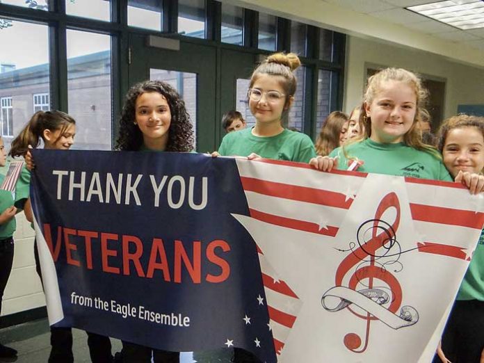 Inman Elementary School students on Nov. 9 hosted more than 100 veterans in celebration of Veterans Day. The event included a parade and a presentation to the school by the James Waldrop Chapter of the Daughters of the American Revolution. Photo/Submitted.