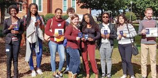 Foreign language students at Sandy Creek High display award medals from poetry contest. (L-R): Lydia Jenkins, Madalya Hardnett, Andrea Huisso, Will Lockridge, Anna Pate, Aiyanna Gulley, Stacy Gonzalez, and Jonathan McClenny. Photo/Submitted.