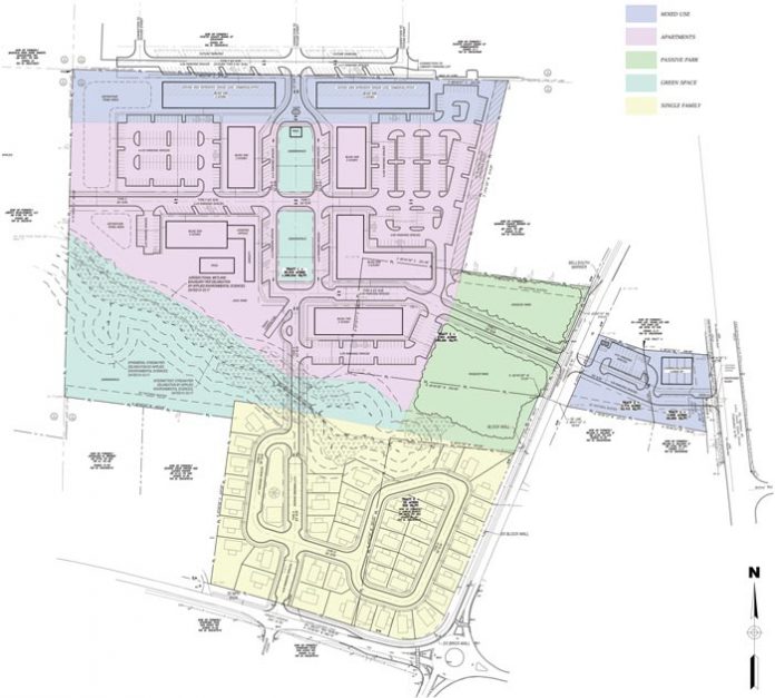 The rendering above shows the current concept plan for the Walton Communities mixed-use proposal on the southwest side of downtown Fayetteville. A recent change to the project would have the Sams property (in green) bordering Beauregard Boulevard serve as a passive park. Rendering/City of Fayetteville.