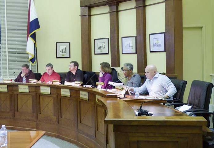 Members of the Fayetteville Planning and Zoning Commission at the Dec. 18 meeting included, from left, commissioners Ken Collins, Toby Spencer and Brett Nolan, Chairman Sarah Murphy, and commissioners Debi Renfroe and Joe Clark. Photo/Ben Nelms.