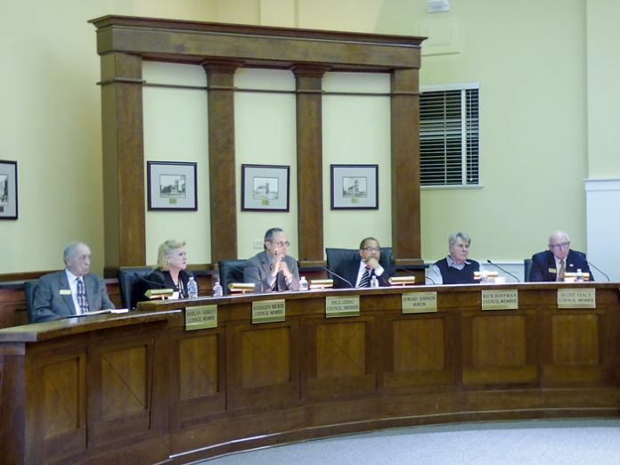 Members of the Fayetteville City Council at the Jan. 3 meeting included, from left, council members Harlan Shirley, Kathaleen Brewer and Paul Oddo, Mayor Ed Johnson and council members Rich Hoffman and Scott Stacy. Photo/Ben Nelms.