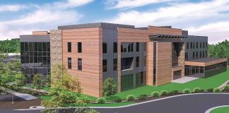 The site now under construction across Lexington Circle from World Gym in Peachtree City will be the site of the 80,000 sq. ft. headquarters of Peachtree City-based logistics technology company SMC3. Rendering/Jefferson Browne Gresham Architects.