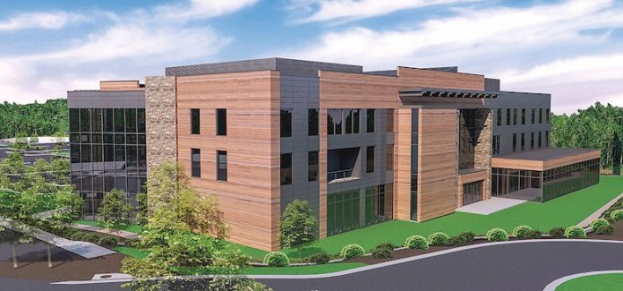 The site now under construction across Lexington Circle from World Gym in Peachtree City will be the site of the 80,000 sq. ft. headquarters of Peachtree City-based logistics technology company SMC3. Rendering/Jefferson Browne Gresham Architects.