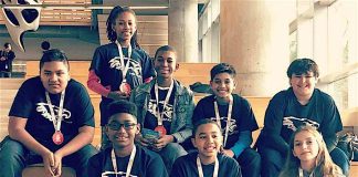 Team I.C.E. shows off their medals and trophy awarded to them for winning the research award at the Georgia First Lego League State Championship held at Georgia Tech. (L-R) Back Row: Michael Baksh, Bre’Yon Guidry, Tyson White, Darion Nandial, Jaden Torres; Front Row: Nicholas Jenkins, Dylan Felker, and Madison Lohr. Photo/Fayette County School System.