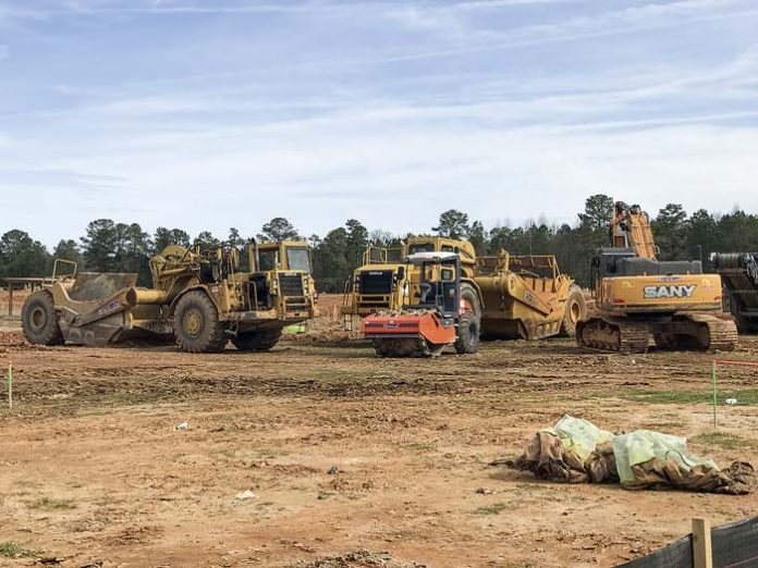 Work is underway on the 157,000 sq. ft. Costco expected to open in August at the Fischer Crossing commercial development on Ga. Highway 34. Photo/Ben Nelms.