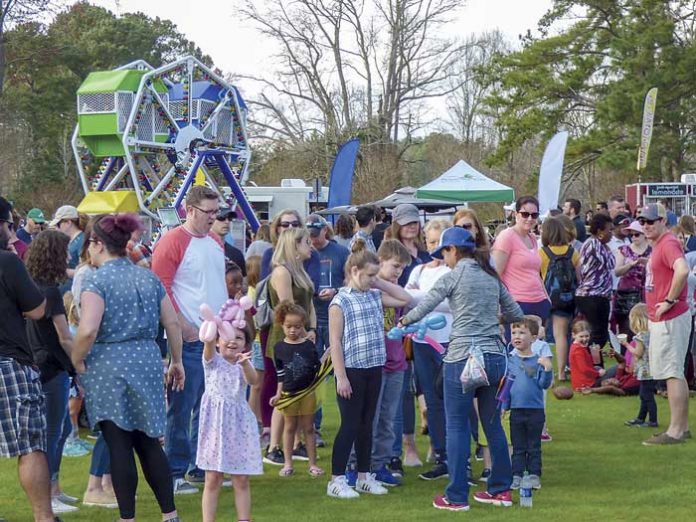 Hundreds of party-goers enjoyed a day of food, rides and balloon-twisting at Drake Field in Peachtree City in observance of the founding of Peachtree City 60 years ago. Photo/Ben Nelms.