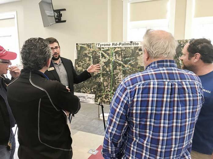 Residents hear an explanation of possible changes to a major corridor in the northwest part of Fayette during a March 18 public meeting to gain input on transportation improvements for the Sandy Creek Road, Tyrone Road-Palmetto Road, Banks Road and Ga. Highway 279 corridors. Photo/Ben Nelms.