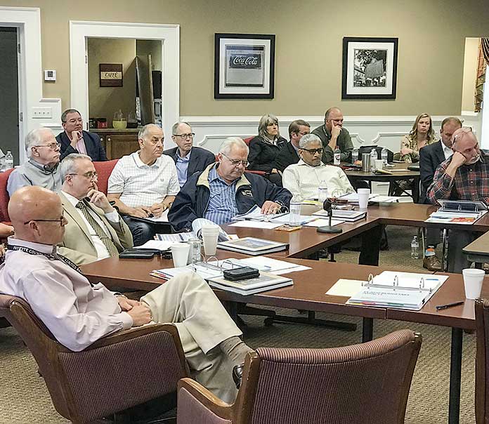 Fayette County commissioners at the April 5 retreat, seated from left, included commissioners Edge Gibbons, Chuck Oddo, Chairman Randy Ognio and commissioners Charles Rousseau and Eric Maxwell. Photo/Ben Nelms.