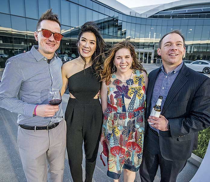 Andrew Smola (from left), Ling-Ling Nie (both residents of Peachtree City), Ellen Taylor and Kevin Barnes enjoy a terrace-level view of the Porsche Experience Center track during the 2nd annual Drive & Dine event benefiting Christian City Children & Family Programs. Photo / Chris Rank Photography