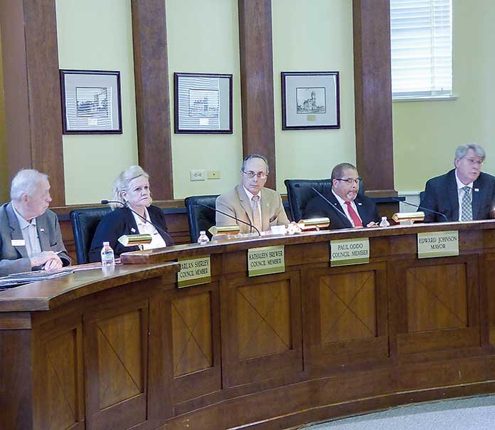 The Fayetteville City Council: from left, council members Harlan Shirley, Kathaleen Brewer and Paul Oddo, Mayor Ed Johnson and Councilman Rich Hoffman. Photo/Ben Nelms.