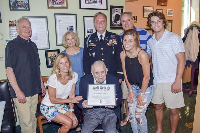 Above: Frank Forth with family and US Army Col. (ret) Rick White. Photo / Tony Armstrong.