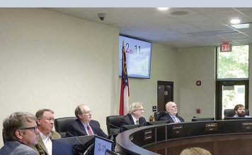 Present at May 20 meeting of the Fayette County Board of Education were, from left, board members Brian Anderson and Barry Marchman, Superintendent Jody Barrow, Chairman Scott Hollowell and board members Roy Rabold and Leonard Presberg. Photo/Ben Nelms.