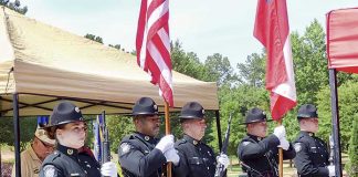 The Fayette County Sheriff’s Office Color Guard presented the colors at the Memorial Day ceremony held at Patriot Park in Fayetteville. Photo/Ben Nelms.