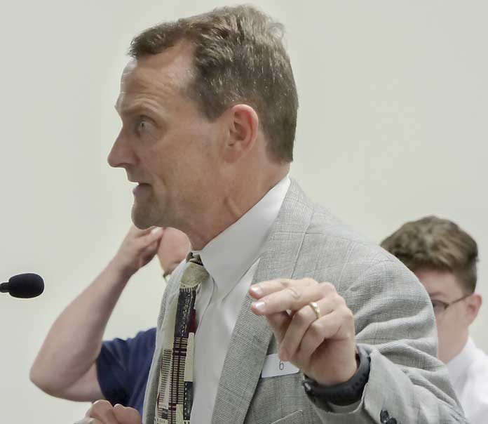 Peachtree City parent and former Ga. Department of Education CFO Scott Austensen speaking on Booth Middle School at the May 20 meeting of the Fayette County Board of Education. Photo/Ben Nelms.