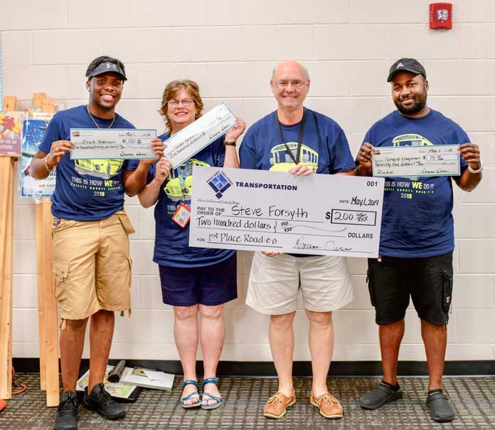Pictured, from left, are School Bus Safety competition winners Erick Jefferson (second place), Susan Gallucci (third place), Steve Forsyth (first place), and rookie of the year Tichard Chapman. Photo/Fayette County School System.