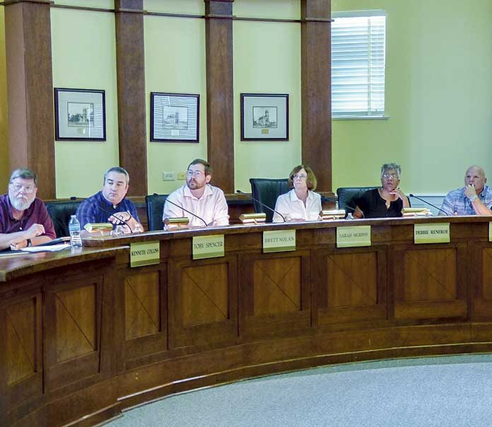 Approvals by the Fayetteville Planning and Zoning Commission on May 28 paves the way for two restaurants to be located at a new business development on Ga. Highway 85 North. Present at the meeting were, from left, commissioners Ken Collins, Toby Spencer and Brett Nolan, Chairman Sarah Murphy and commissioners Debi Renfro and Joe Clark. Photo/Ben Nelms.