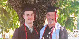 Zachary Pye, 22, and his father, Peachtree City Assistant Police Chief Stan Pye, 58, earned degrees from Georgia Military College June 1. Photo/Submitted.