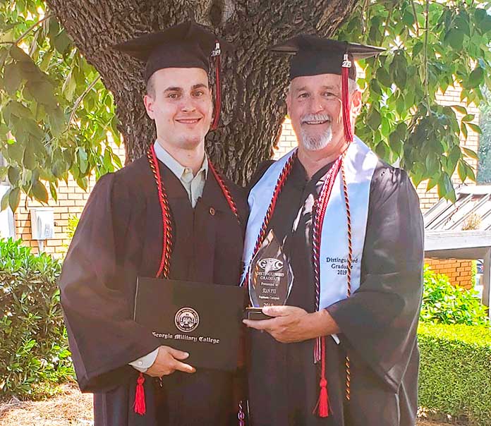 Zachary Pye, 22, and his father, Peachtree City Assistant Police Chief Stan Pye, 58, earned degrees from Georgia Military College June 1. Photo/Submitted.
