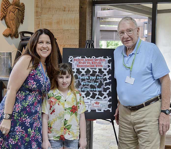 Pictured are Natalie Hynson, FSS Case Manager, Oscar Keplinger, MOW Volunteer, and Oscar’s granddaughter who ran the route with him during her time off from school this summer.