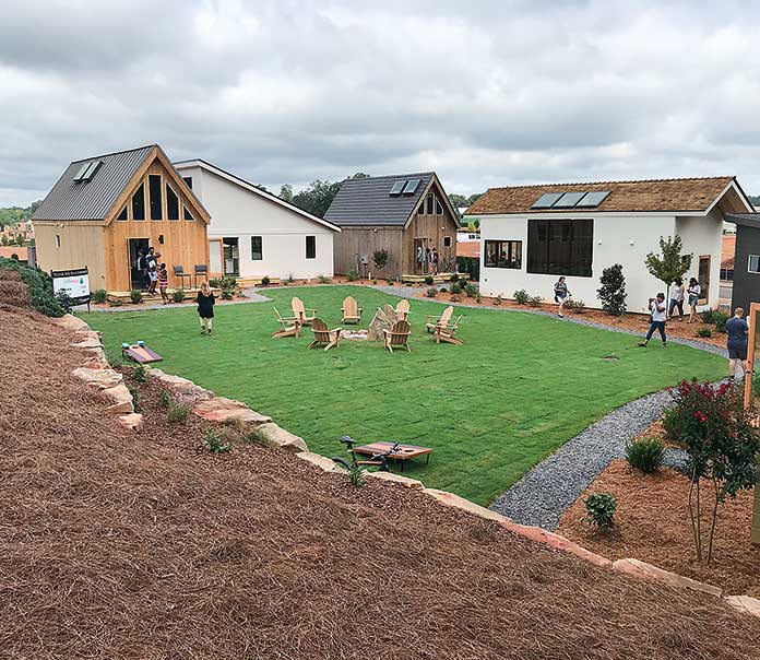 Pinewood Forest on July 20 unveiled its first Micro Home Village that includes six micro homes ranging from 408-542 sq. ft. Photo/Ben Nelms.