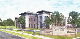 The new Fayetteville City Hall will be located on Stonewall Avenue, one block west of downtown, the current site of the former school system office. The project, and that of the adjacent City Center Park, are anticipated to be complete in late 2020. Rendering/City of Fayetteville.