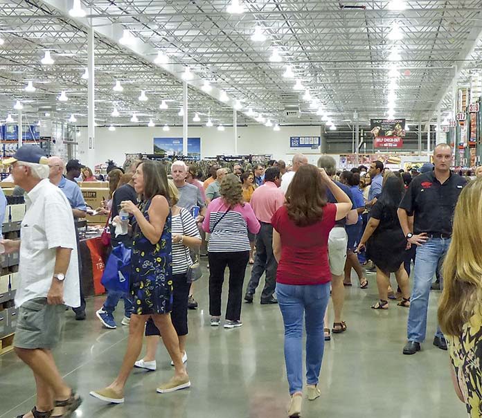 The new Costco at the Fischer Crossing commercial area along Ga. Highway 34 in east Coweta County opened Aug 22. It was on the previous evening that a few thousand took advantage of a wealth of complimentary meals while getting a close-up look at the offerings in store for customers the following day. Photo/Ben Nelms.