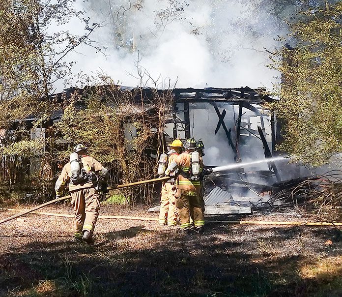 Firefighters on Sept. 4 battled a fire at an unoccupied home on Ga. Highway 85 South. Photo/Fayette County Fire and Emergency Services.