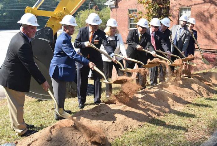 Fayetteville city officials and project and design representatives threw the first shovels of dirt at the Oct. 1 groundbreaking for the new 10-acre City Hall and City Center Park project located on Stonewall Avenue near downtown. (L-R) Rob Ragan with New South Construction, Eric Johnson with Comprehensive Program Services, City Council members Paul Oddo and Kathaleen Brewer, Mayor Ed Johnson, Council Member Scott Stacy, Mayor Pro-Tem Rich Hoffman, City Manager Ray Gibson, and Amy Bell with Goodwyn, Mills and Cawood. Photo/City of Fayetteville.