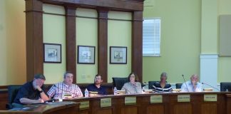 Members of the Fayetteville Planning and Zoning Commission at the Oct. 22 meeting included, from left, commissioners Ken Collins, Toby Spencer and Brett Nolan, Chairman Sarah Murphy, and commissioners Debi Renfroe and Joe Clark. Photo/Ben Nelms.