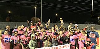 Sandy Creek Junior Patriots 11U football team marks a perfect 10-0 season with Super Bowl trophy. Photo/Shayla Wiggins.