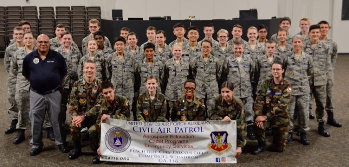 Thirty-seven new Civil Air Patrol recruits recently earned their first rank from the Peachtree City Falcon Field Composite Squadron. Photo/Candice Serafin.